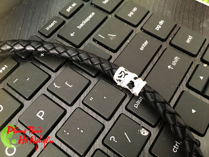 dây da bọc bạc hình rồng